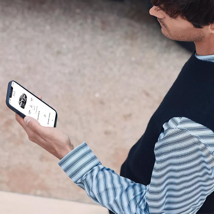 A person holding a mobile phone