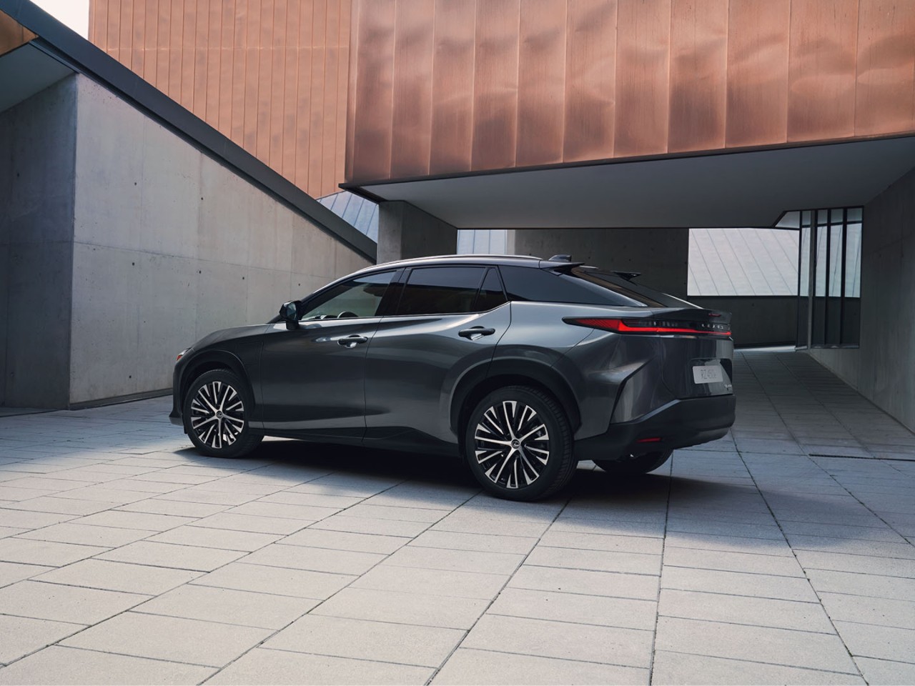 2022-lexus-rz-campaign-presales-ext-feature-overlay-stunning-looks-powerful-4x3-1440x1080